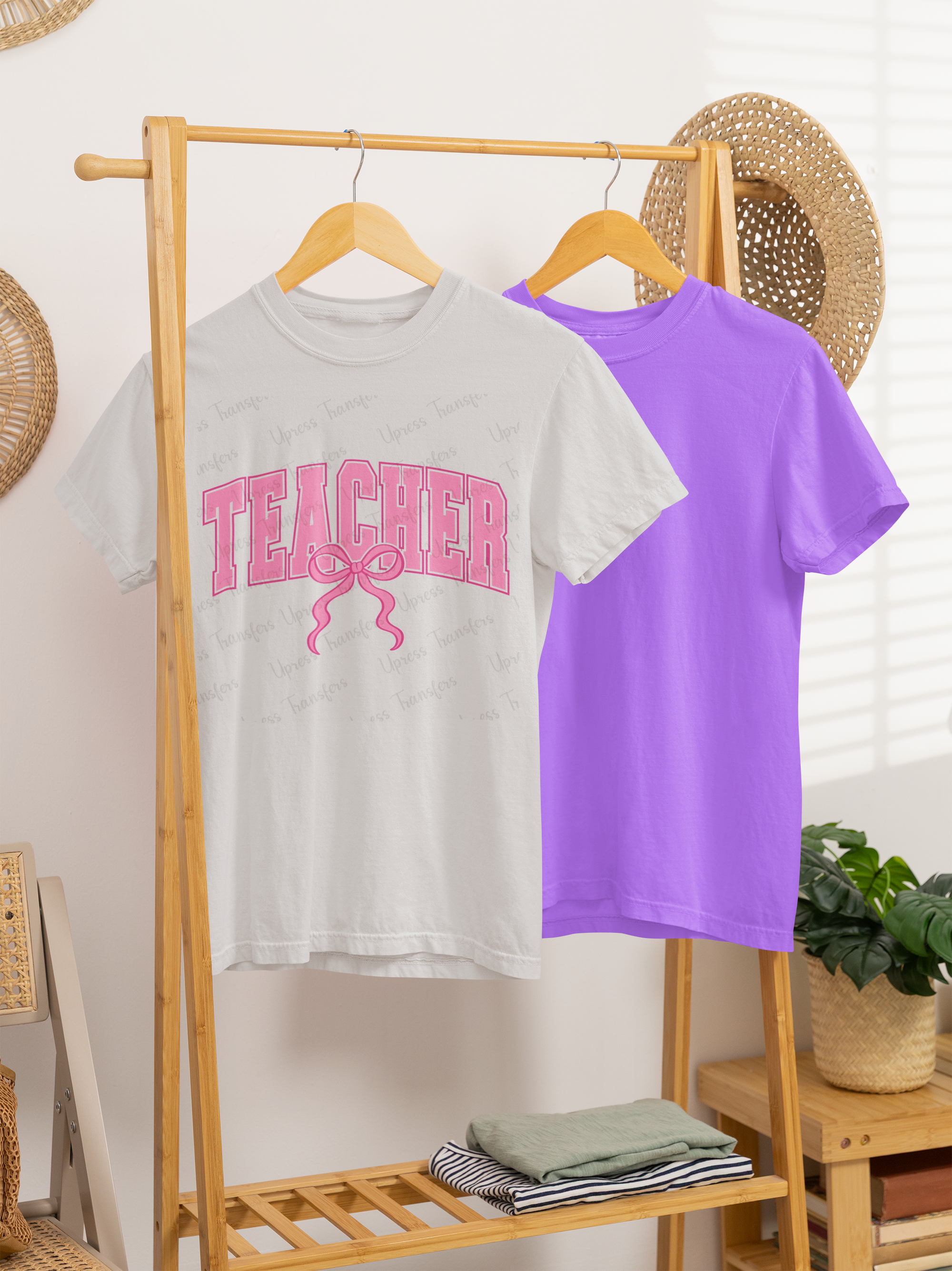 Hot pink "Teacher" tee with a bow